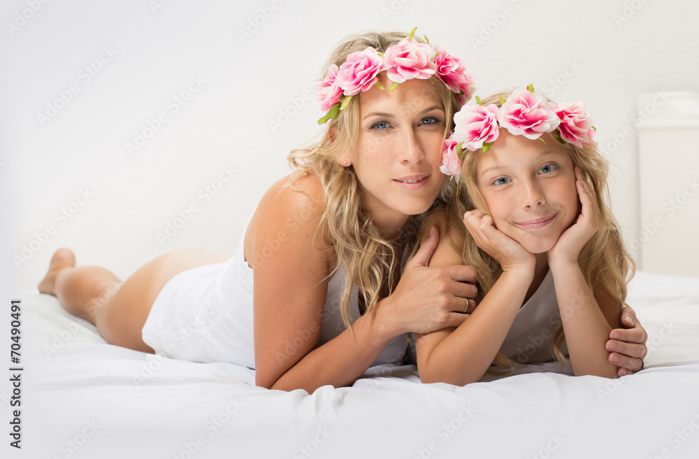 Beautiful blonde mother and daughter together Beautiful blonde mother and daughter together