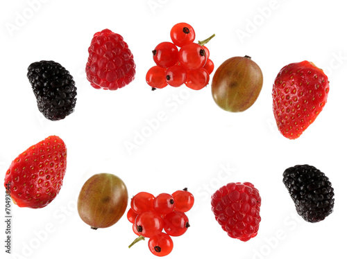 Fresh berries skewers isolated on white