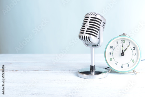 Vintage microphone and alarm clock