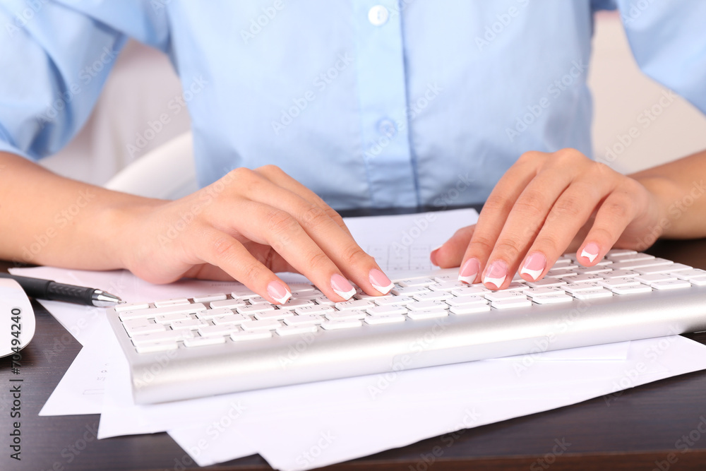 Female hands typing on keyboard, close-up Female hands typing on keyboard, close-up