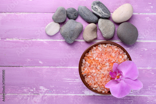 Fototapeta Naklejka Na Ścianę i Meble -  Still life with beautiful blooming orchid flower, sea salt and