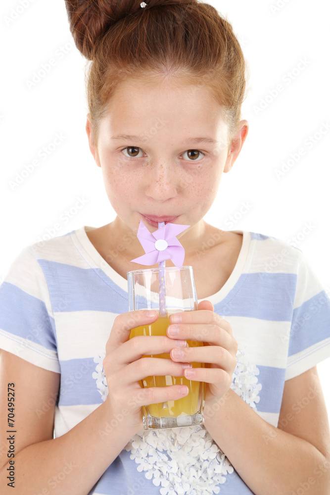 Beautiful little girl holding glass of juice close up Beautiful little girl holding glass of juice close up