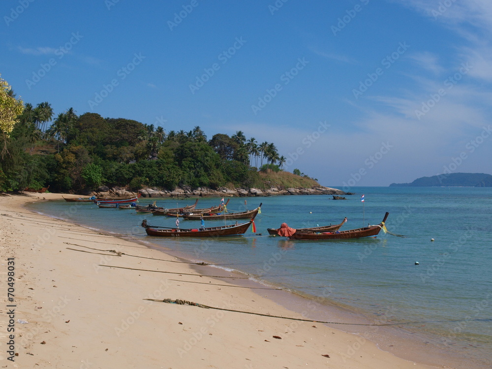 longtail boats in bay of Phuket island, Thailand.