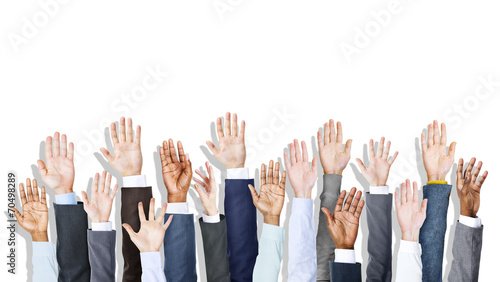 Group of Diverse Business People's Hands Raised