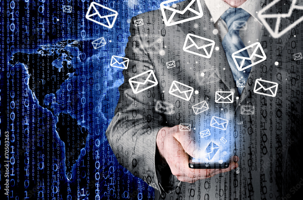 Business man holding smart phone and sending emails Business man holding smart phone and sending emails