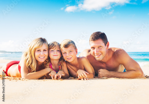 Family of Four on Tropical Beach