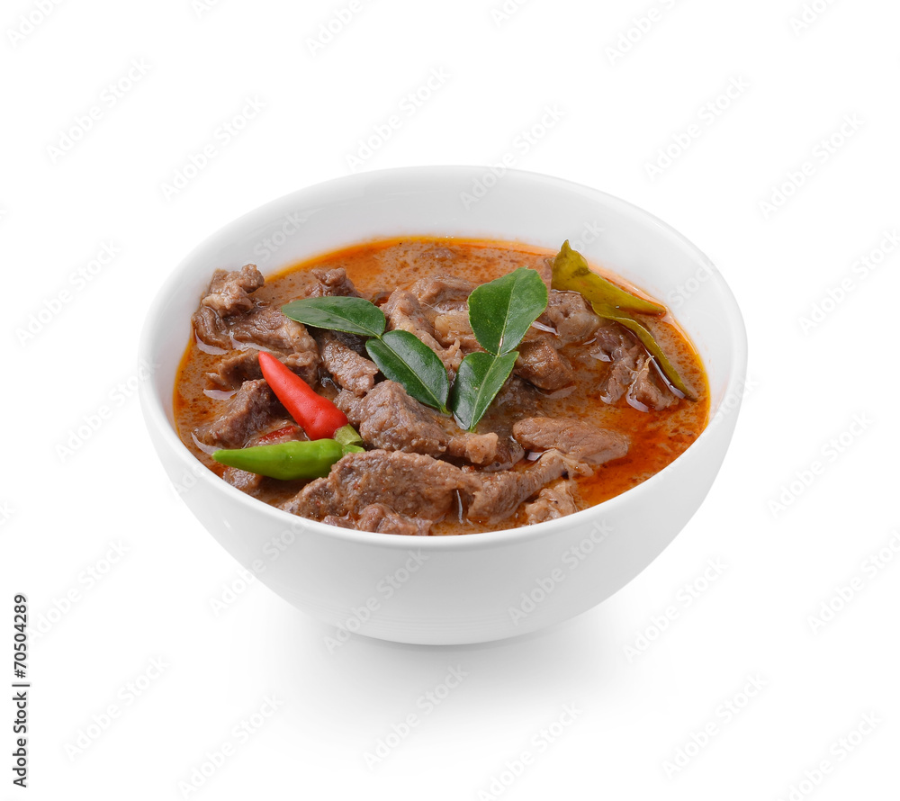 Panang curry with pork on white background Panang curry with pork on white background