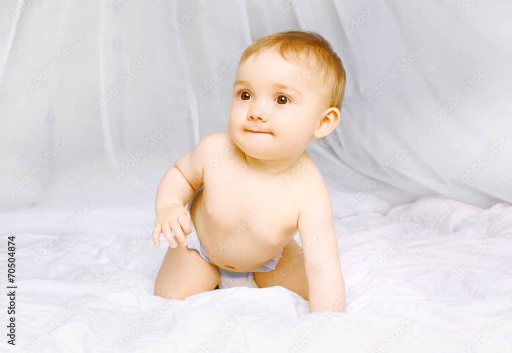 Little baby on the bed