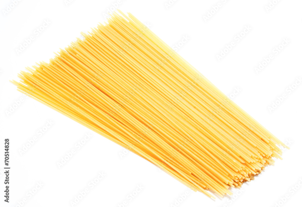 Uncooked Italian spaghetti isolated on a white Uncooked Italian spaghetti isolated on a white