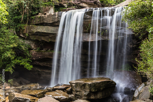 thung na muang waterfall in the rainforest on thailand