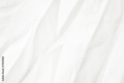 Wrinkle white canvas fabric texture.