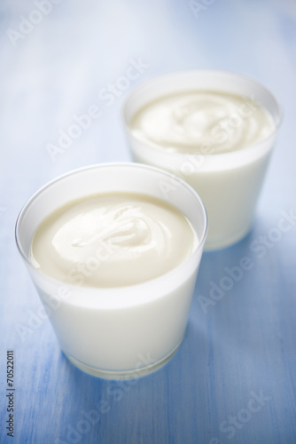 Homemade yogurt on blue background