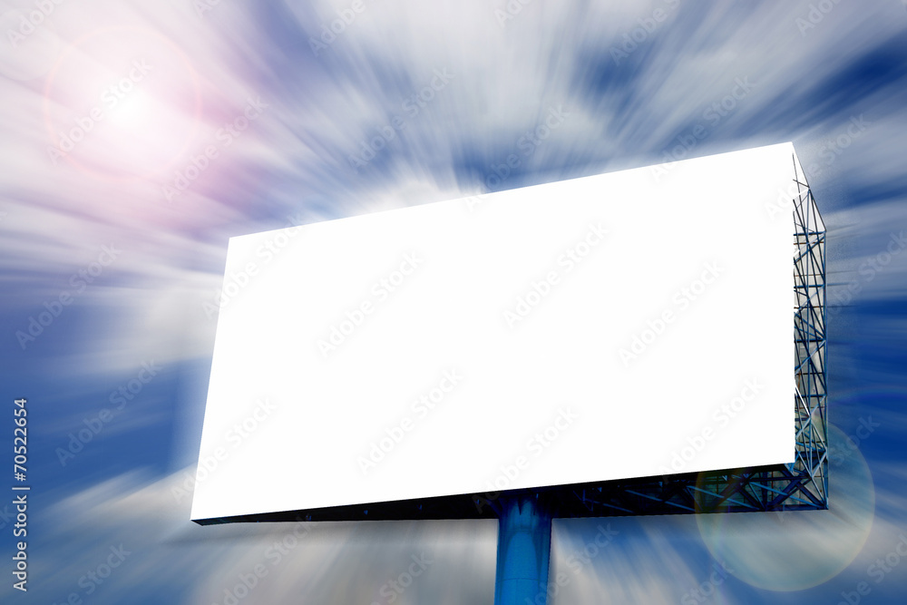 Fototapeta premium Blank Billboard on blue sky in motion blur