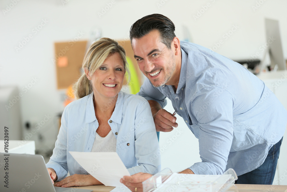 Business people working in office on laptop Business people working in office on laptop