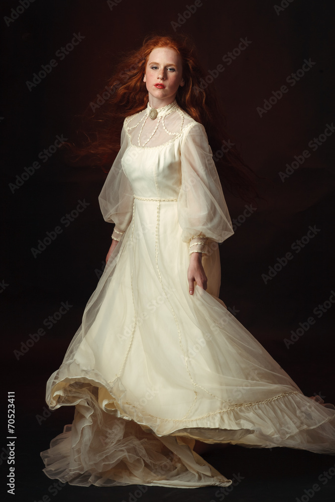 Portrait of the elegant woman in medieval era dress. Portrait of the elegant woman in medieval era dress.