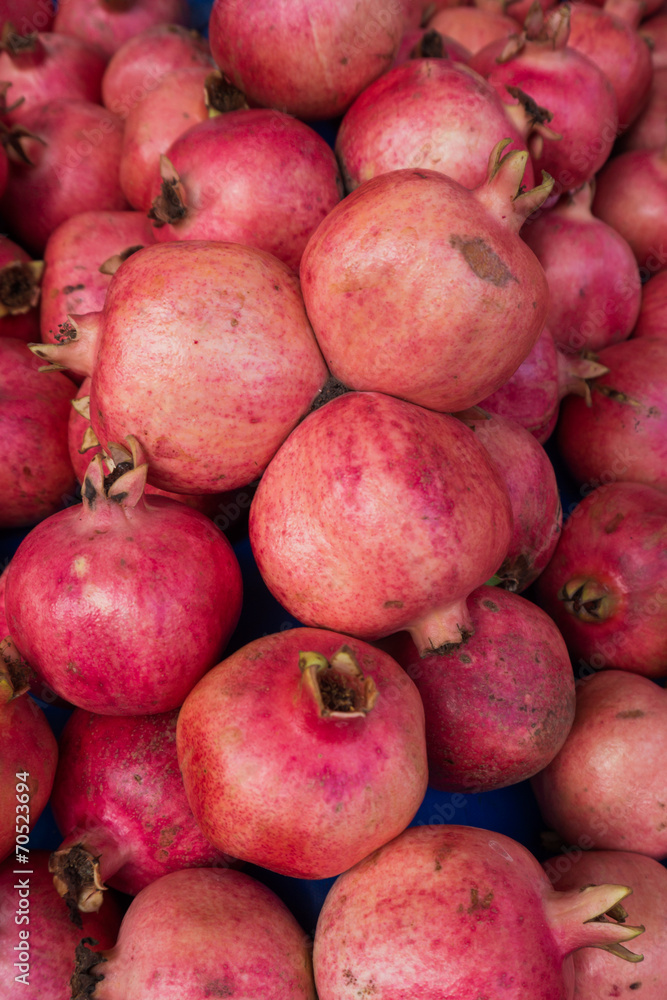 group of pomegranates. pomegranate closeup, background group of pomegranates. pomegranate closeup, background