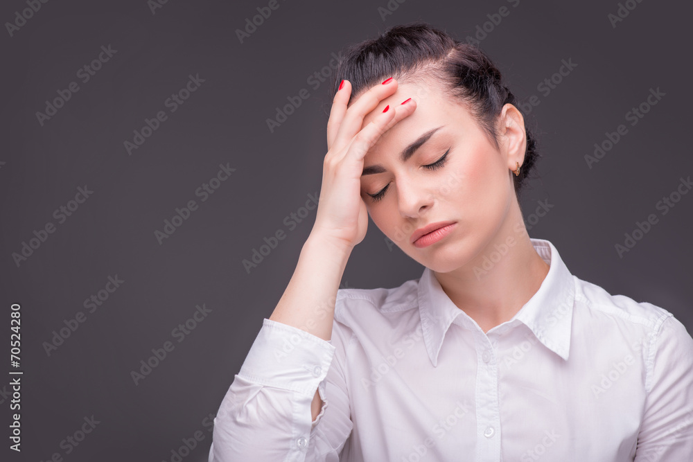 Serious woman wearing white blouse Serious woman wearing white blouse