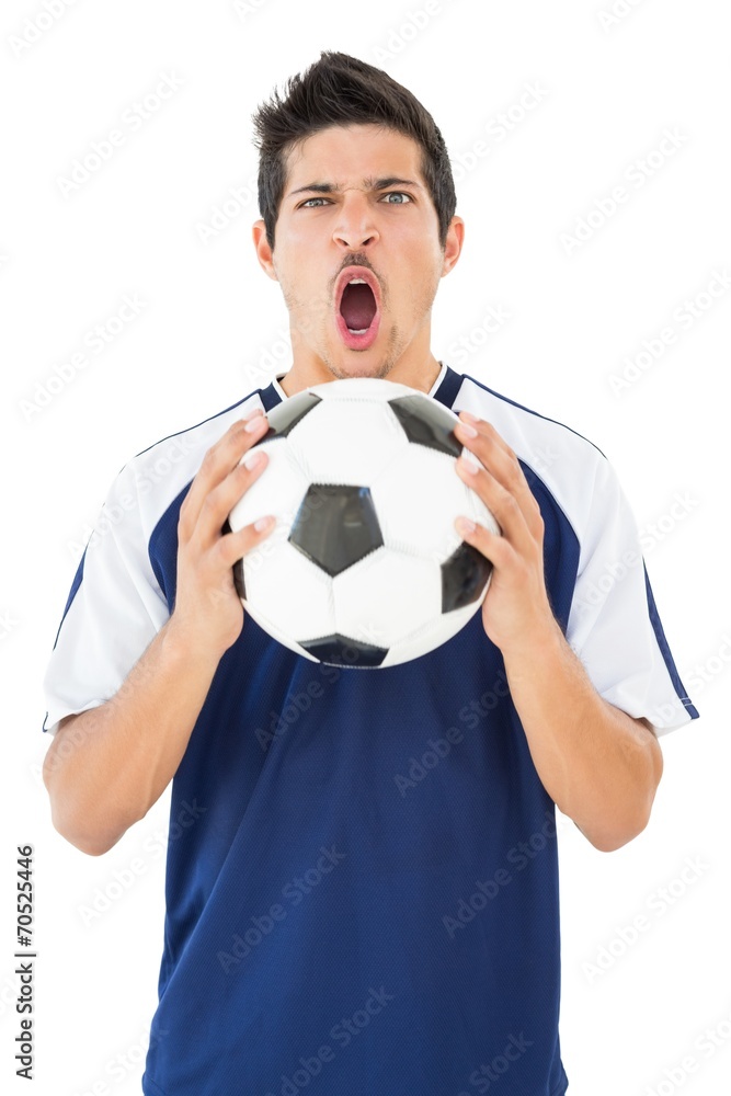 Portrait of a football player shouting Portrait of a football player shouting