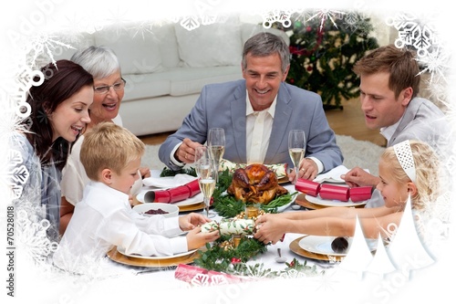 Children pulling a christmas cracker at home