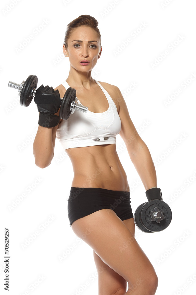 young fit woman lifting dumbbells on white background young fit woman lifting dumbbells on white background