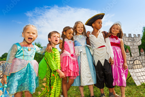 Children diversity in festival costumes standing