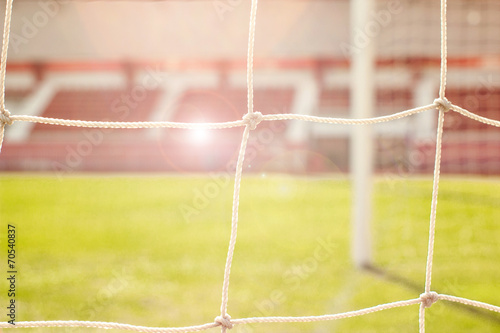 behind the net with Stadium background