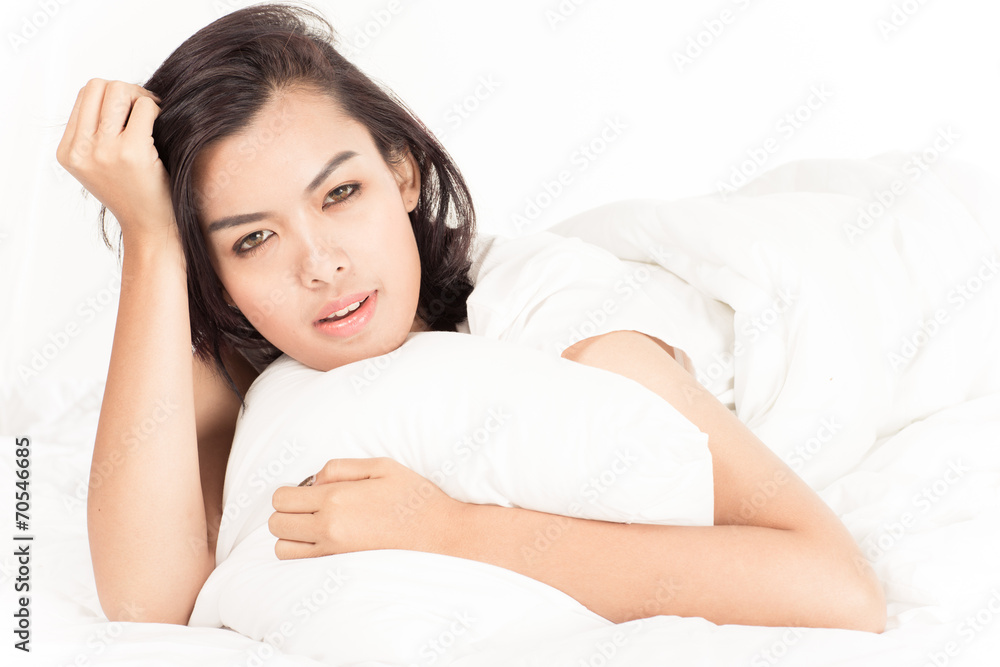 Portrait of a beautiful young woman in bed Portrait of a beautiful young woman in bed