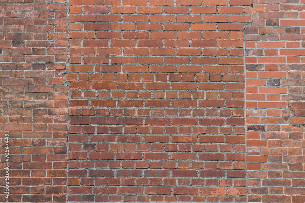 Naklejka premium れんが壁 stone wall background