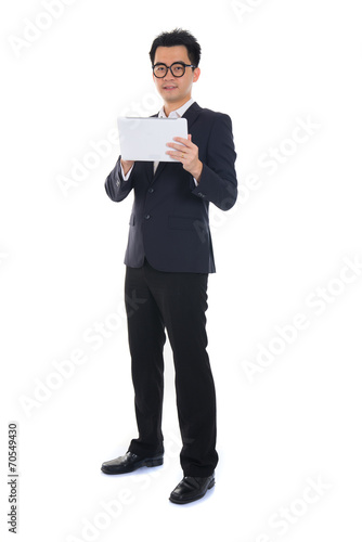 chinese business man using tablet