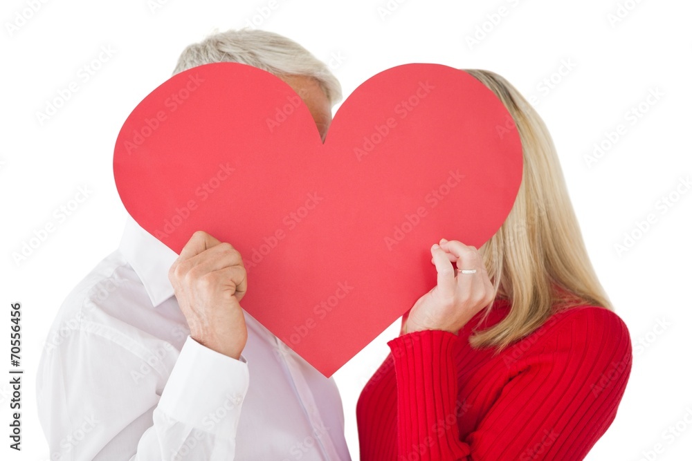 Mature couple holding heart Mature couple holding heart
