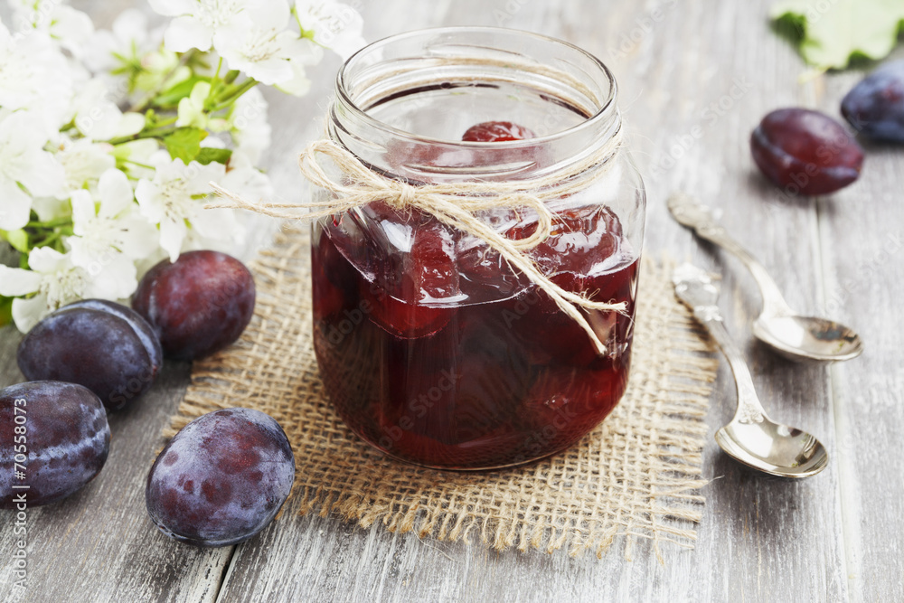 Plum jam in a glass jar Plum jam in a glass jar
