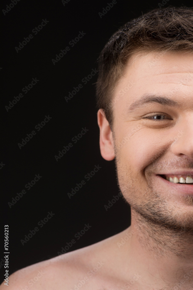 Facial close up of half attractive man face isolated Facial close up of half attractive man face isolated
