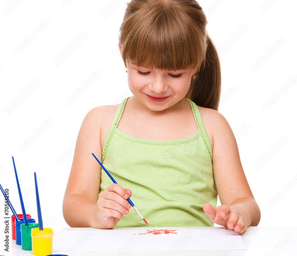 Cute thoughtful child play with paints Cute thoughtful child play with paints