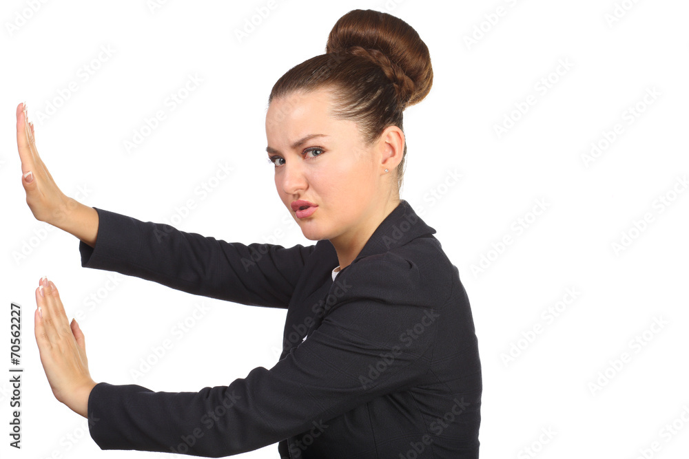 Beautiful girl with a chignon makes repulsive motion Beautiful girl with a chignon makes repulsive motion