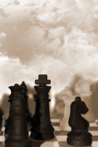 chess pieces isolated against sky