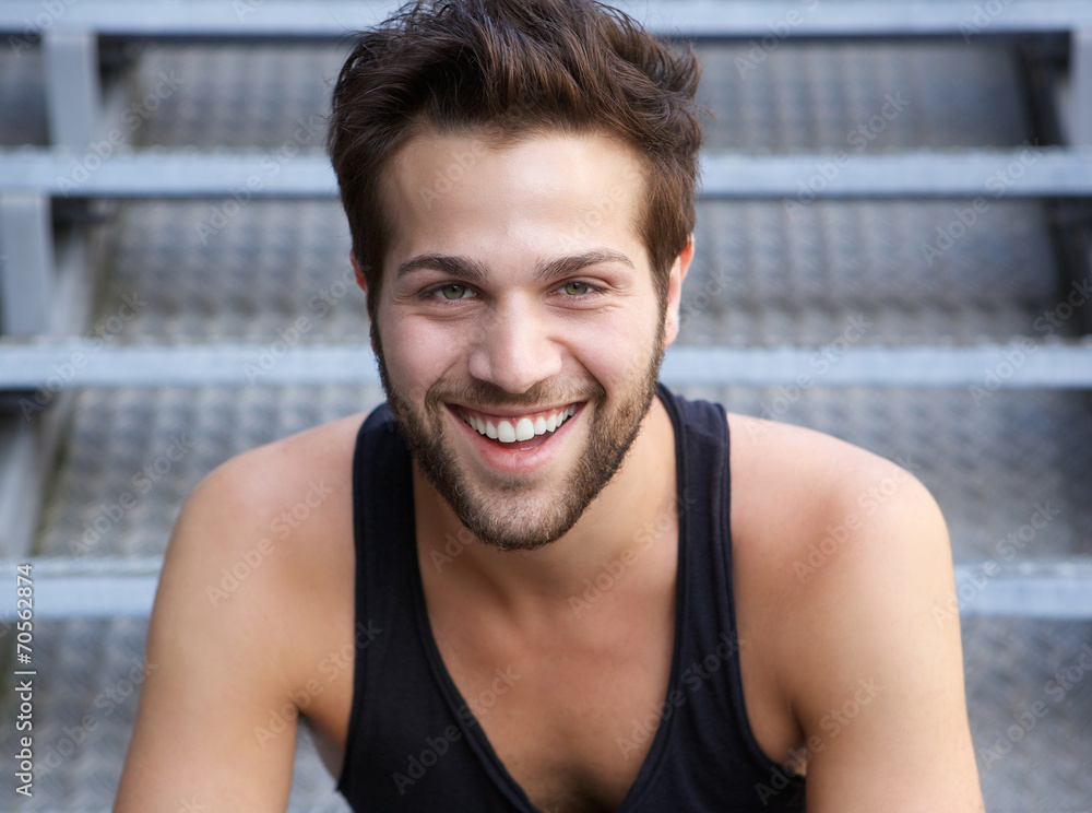 Fototapeta premium Handsome young man with beard smiling