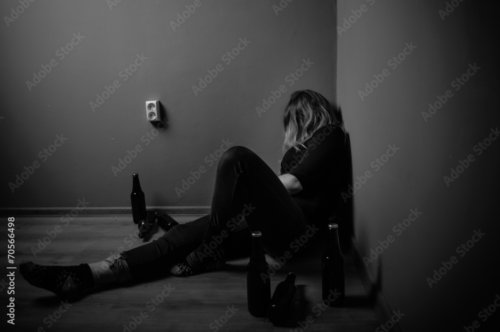 sad woman drinking alcohol, black and white