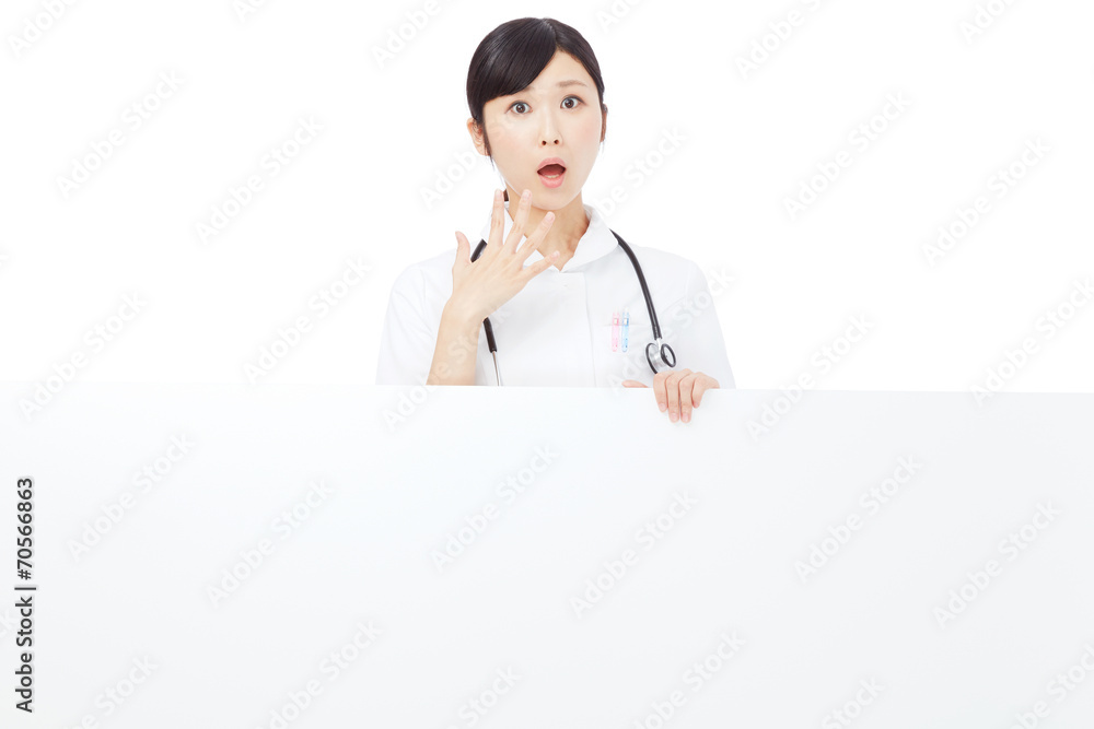 メッセージボードと驚くナース