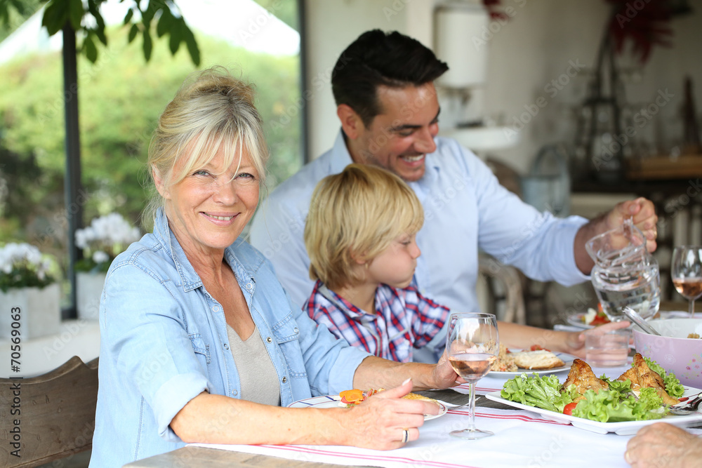 Family having summmer lunch in country house Family having summmer lunch in country house