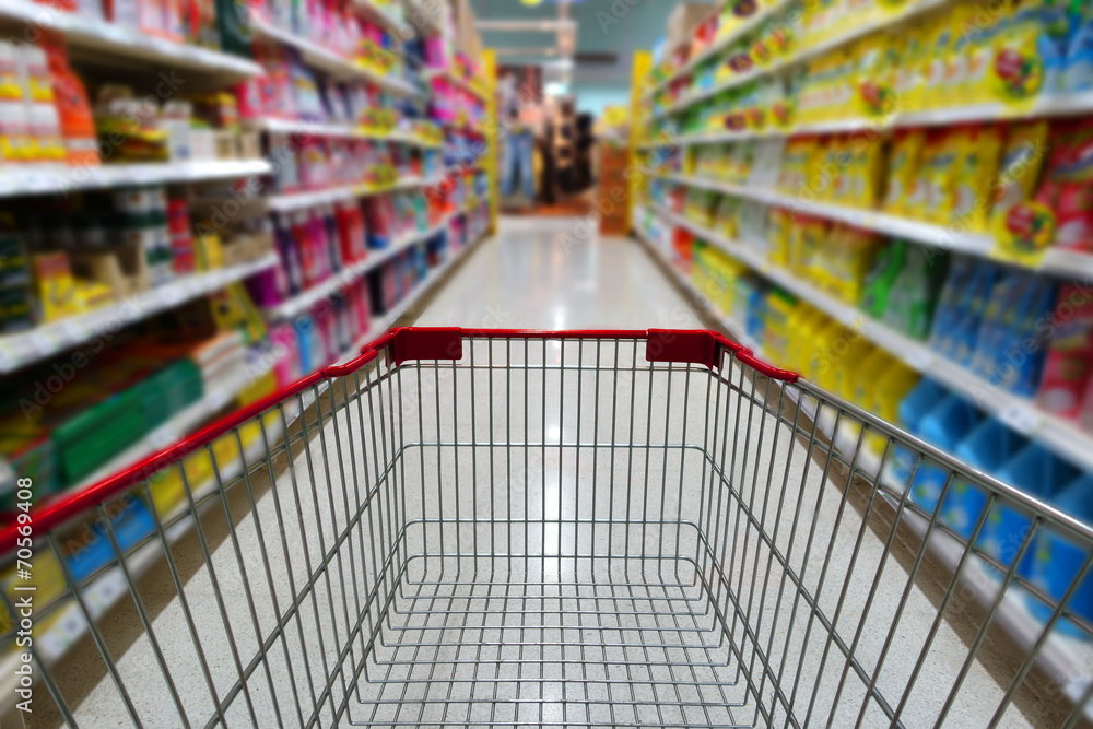 Shopping cart in supermarket Shopping cart in supermarket