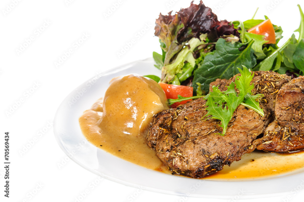 Rump steak with mashed potatoes and mix vegetable on plate Rump steak with mashed potatoes and mix vegetable on plate