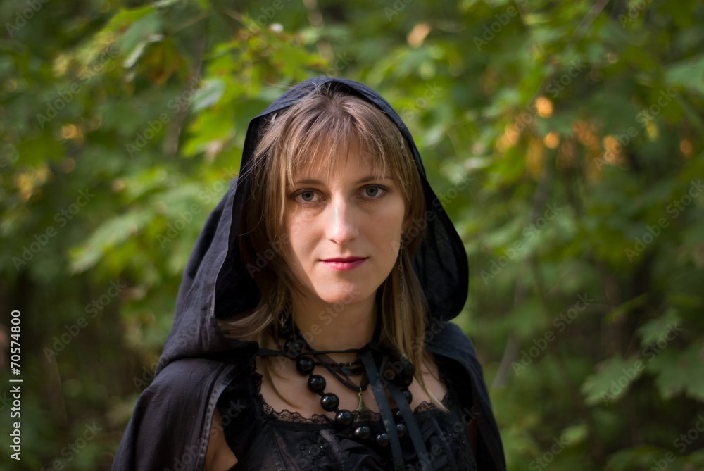 Fototapeta premium Portrait of Witch in the Forest