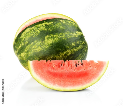 Studio shot whole and slice of watermelon isolated white