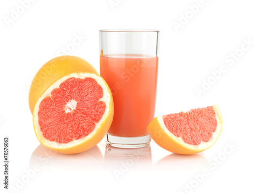 Studio shot sliced three grapefruits with juice isolated white