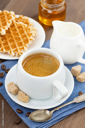 cup of coffee, waffles and honey, selective focus