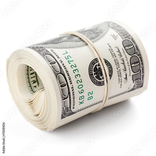 Hundred dollar bills rolled up with rubberband. Clipping Path..