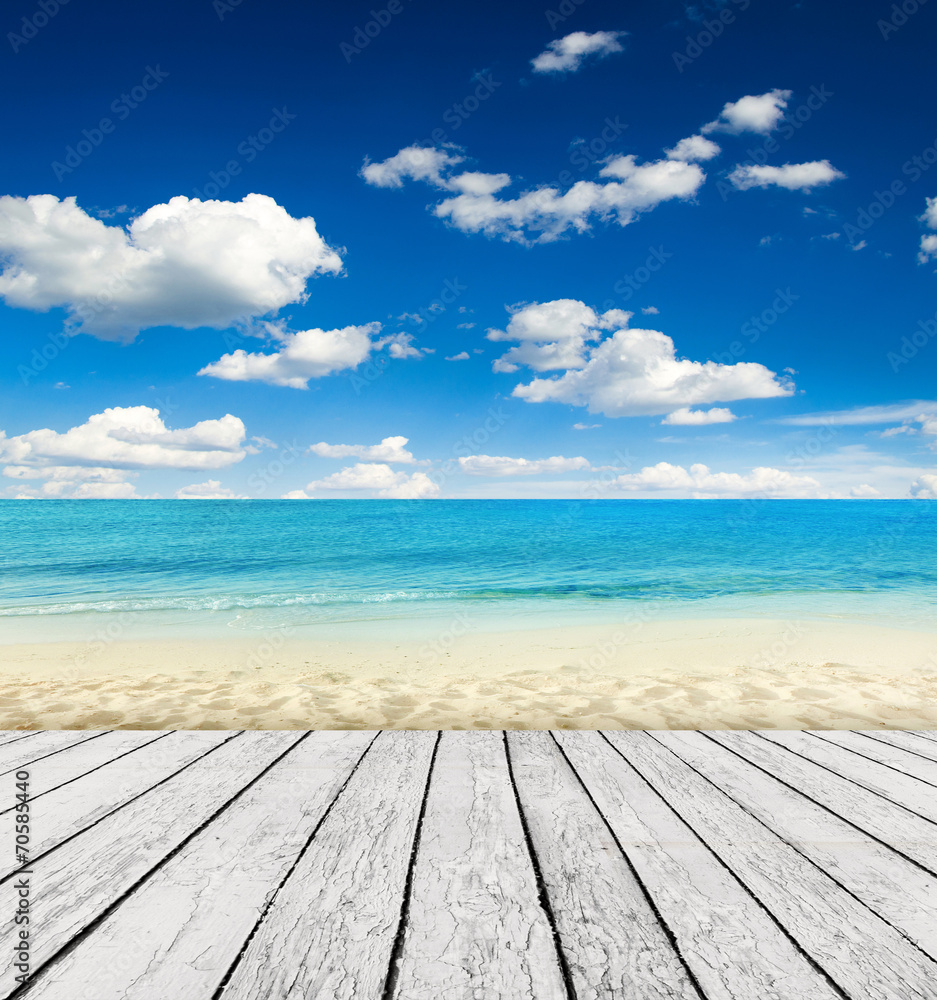 Empty wooden pier beside tropical beach Empty wooden pier beside tropical beach