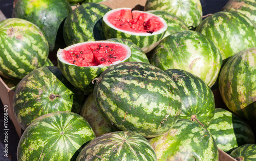 Fresh watermelons for sale at the local farmers market