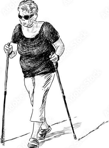elderly woman at the nordic walk