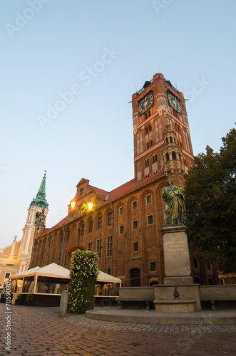 Morning in Torun, Poland. City Hall. Copernicus Monument.